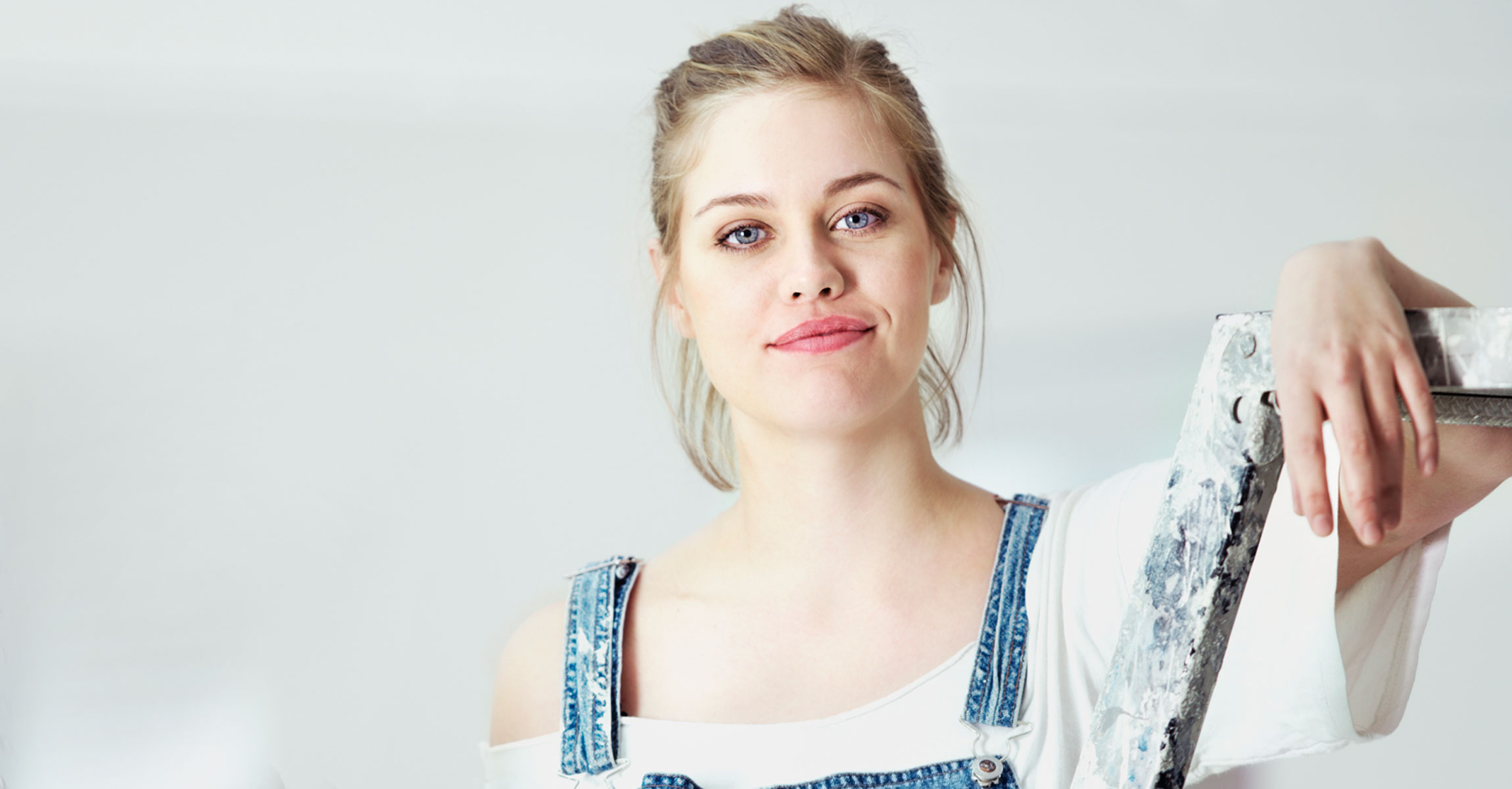 woman in painting outfit