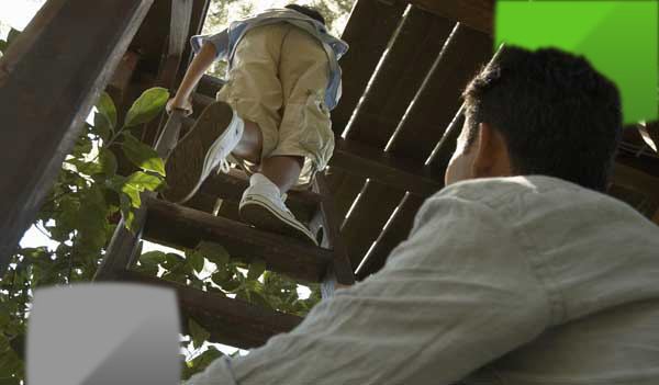 climbing into treehouse