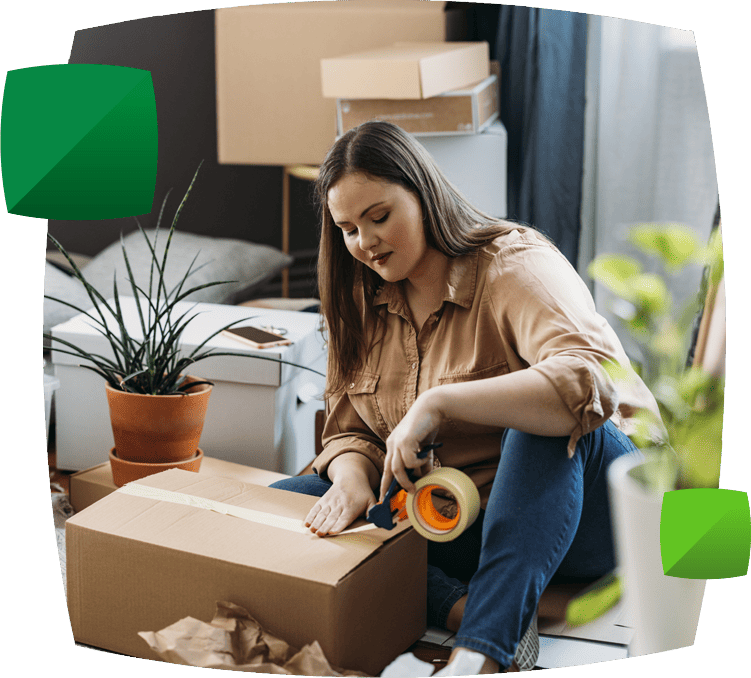 Woman taping box